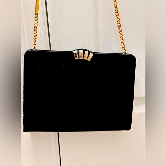 Salvatore Ferragamo Handbags - Authentic Salvatore Ferragamo Vintage Gold Chain black leather purse.